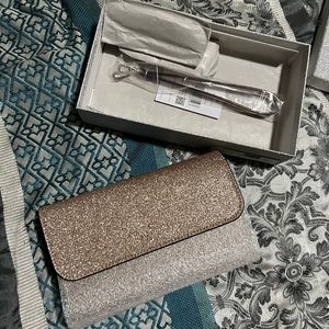 Kate Spade new in box glitter rose gold medium phone wristlet